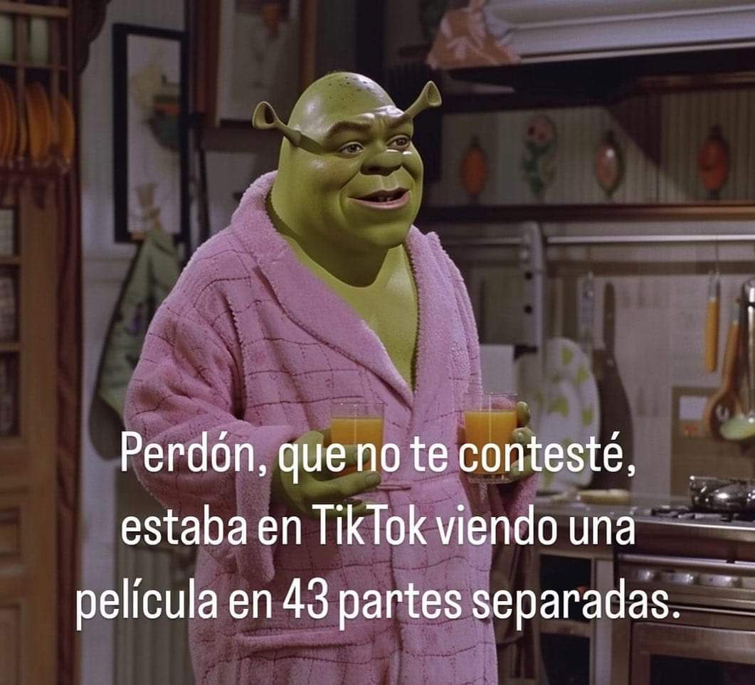 a cartoon character in a pink robe standing in a kitchen